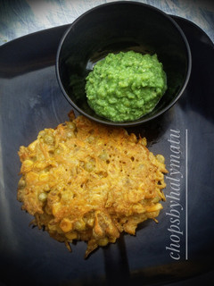 A picture of Veggies pancake with green pea chutney.