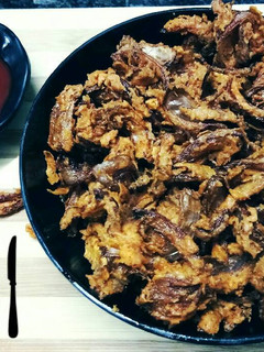 A picture of Onion ke crispy pakode.