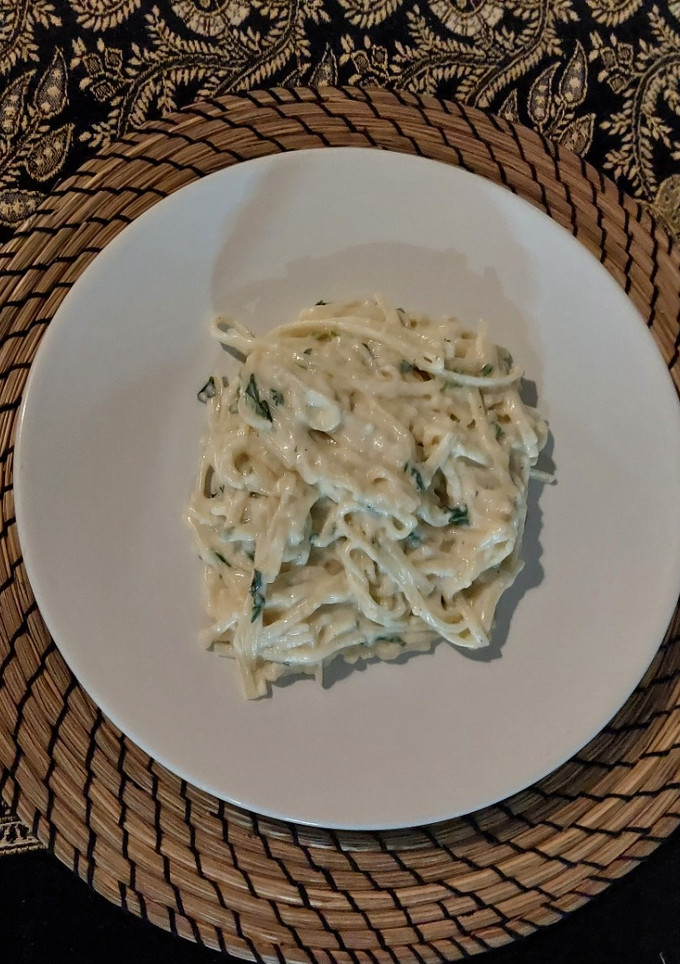 Una foto de Spaghetti con bechamel y queso