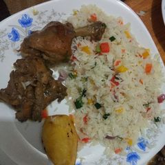 A picture of Fried chicken and vegetable rice #charity recipe.