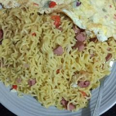 A picture of Noodles and omelette.