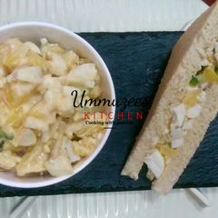 A picture of Egg and potato sandwich.