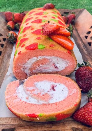 A picture of Three layer Strawberry 🍓 Swiss roll.