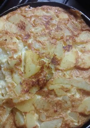 Una foto de Tortilla de papas jamón y queso