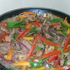 Stirfried beef fleaks A picture of Stirfried beef fleaks.