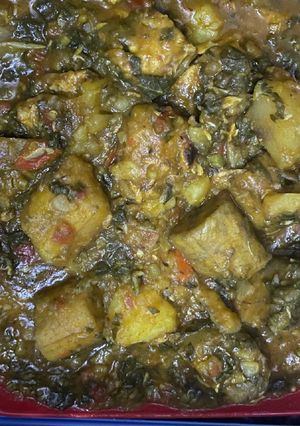A picture of Potatoes and plantain porridge with vegetable.
