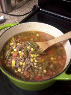 A picture of CowBoy Stew with White rice.