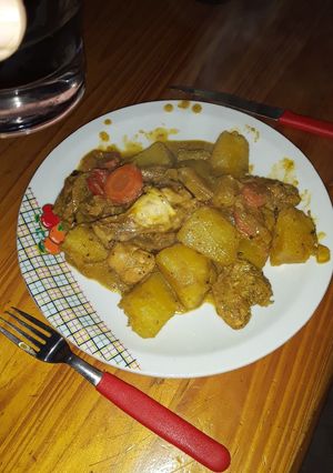 Una foto de Pollo al curry en el disco