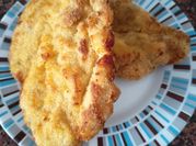 Una foto de pollo empanado con harina