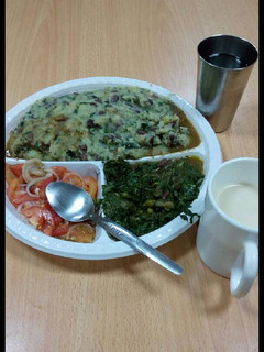 A picture of Mokimo,kachumbari with greens.