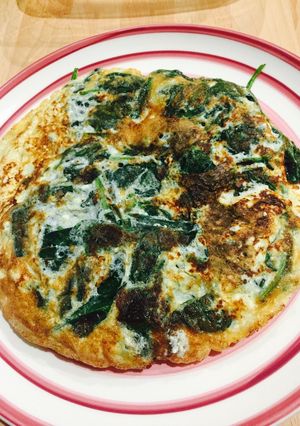 Una foto de Tortilla de espinacas y requesón