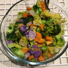 A picture of Microwave veggies salad with poppyseed dressing.