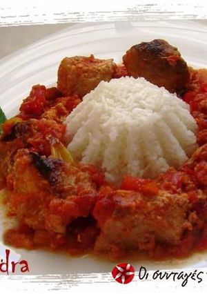 A picture of Pork with kefalotyri and peppers.