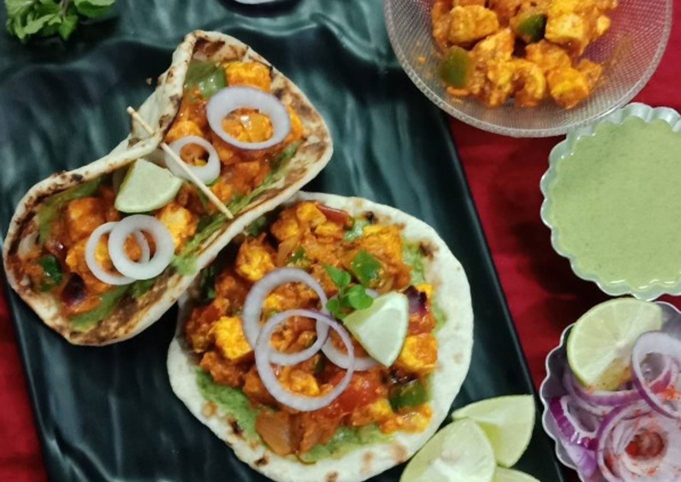 Paneer tikka masala in naan tacos