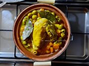 Une photo de tajine citrons confits olives