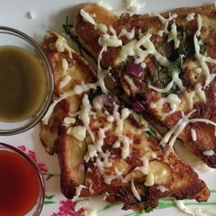 Egg cheese herbal bread toast A picture of Egg cheese herbal bread toast.