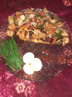 A picture of Fish with soutay Vegetables & Baked Fishy Parcels.