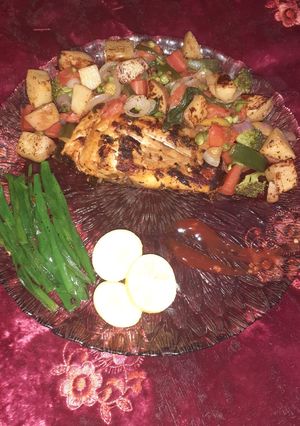 A picture of Fish with soutay Vegetables & Baked Fishy Parcels.