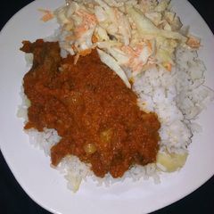 A picture of White rice with stew.