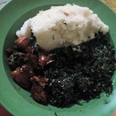 A picture of Ugali skuma with soy honey pork.
