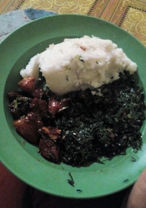 A picture of Ugali skuma with soy honey pork.