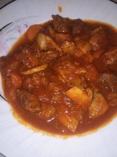 A picture of Village way meat with mushrooms 🍖 🍄.