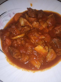 A picture of Village way meat with mushrooms 🍖 🍄.