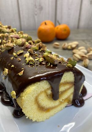 Foto di Rotolo al mandarino cioccolato e pistacchio