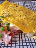 Omelette colorido con tocino