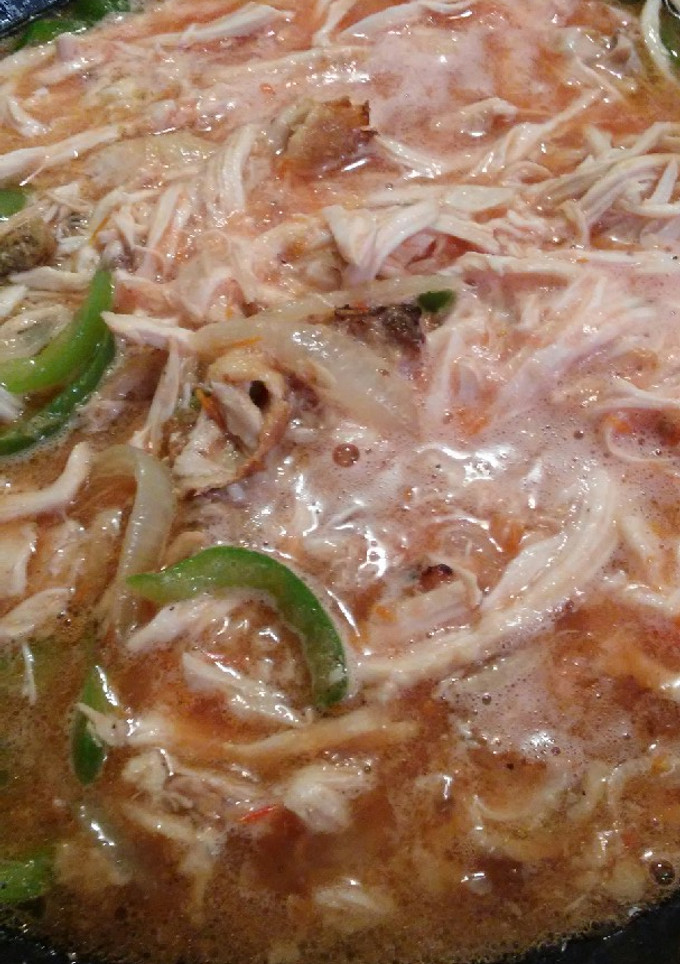 Una foto de Carne desmenuzado en salsa