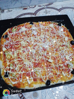 صورة لوصفة بيتزا