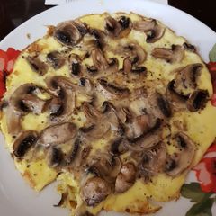 A picture of A plain Mushroom Omelette.