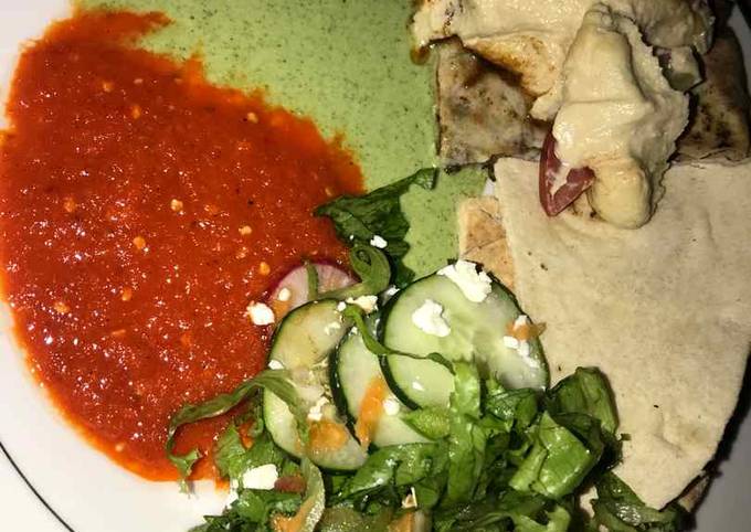 Gurasa with salad and tomato stew with cucumber
