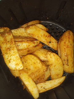 Una foto de Papas en gajos estilo pizzería