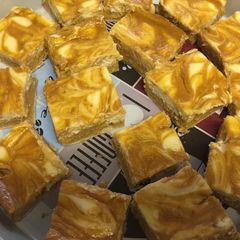 A picture of Pumpkin Swirl Cheesecake Bars.