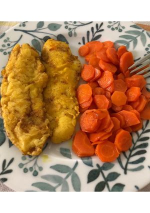 Foto di Filetto di pesce infarinato con le carote in padella 🐟🥕