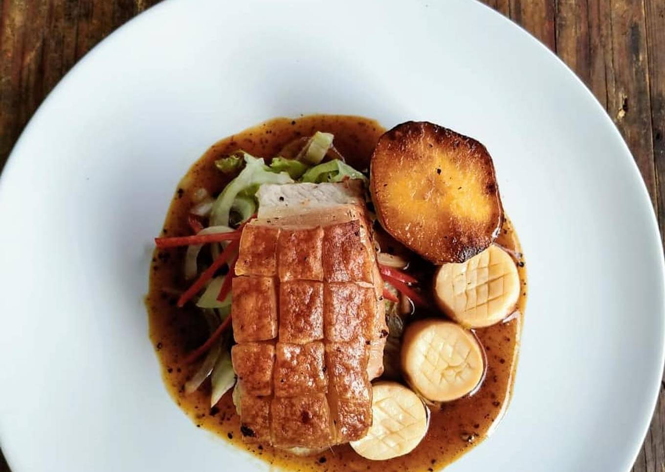 Crispy Pork Belly with Fondant Potato and Blackpepper Sauce