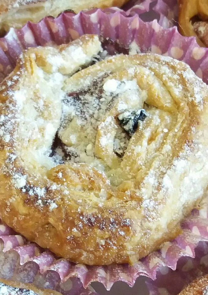 Una foto de Rollitos de hojaldre con arándanos y frutos secos