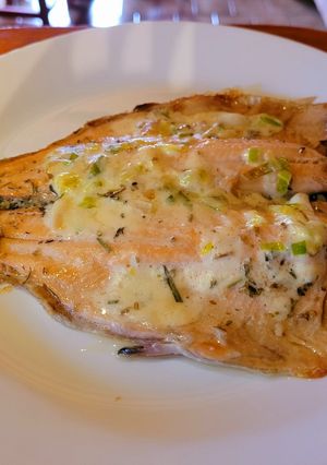 Una foto de Trucha al horno con queso ahumado