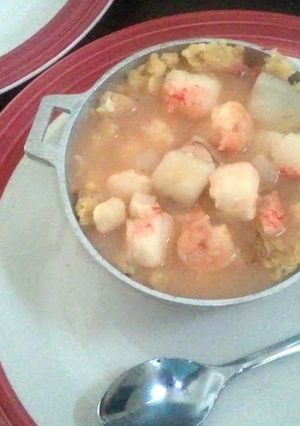A picture of Mofongo con Sopa de Mariscos.