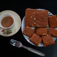 A picture of Orange flavoured carrot pistachios cake.