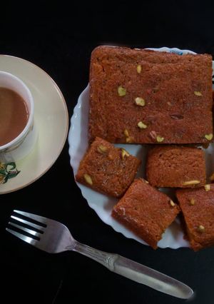 A picture of Orange flavoured carrot pistachios cake.
