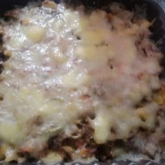 A picture of Mince rice pizza.
