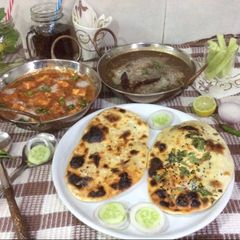 A picture of Dal Makhani Restaurant style,Shahi Paneer,butter Naan & garlic Naan.