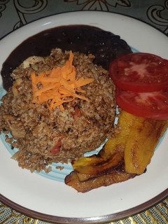 Una foto de Locrio de chuleta con trigo 🇩🇴🇩🇴🇩🇴