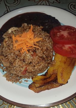 Una foto de Locrio de chuleta con trigo 🇩🇴🇩🇴🇩🇴