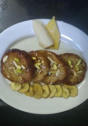 મલાઈ કેળા માલપુઆ રેસીપી મુખ્ય ફોટો