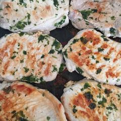 A picture of Pork Loin with fresh Coriander and Lime.