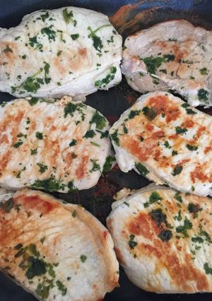 A picture of Pork Loin with fresh Coriander and Lime.