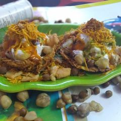 A picture of Aloo lachha katori with moong Dal bhalla chaat.